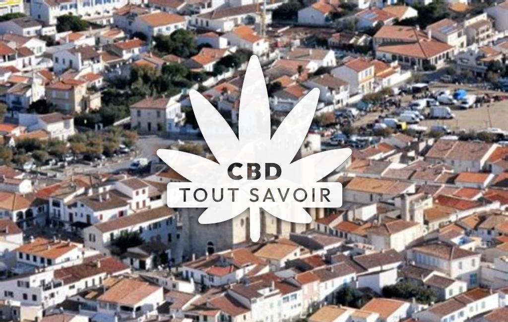 Village à Saintes-Maries-de-la-Mer avec feuille Cannabis CBD